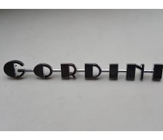 chromovaný nápis Gordini