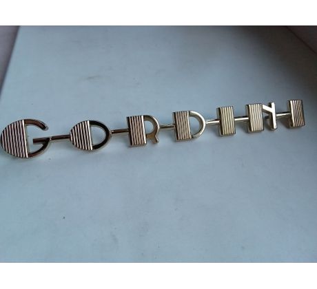 chromovaný kovový nápis Gordini